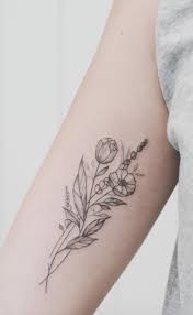This forearm tattoo likely depicts the cycle of human life, too and reminds the wearer that even the tightest of buds can bloom into gorgeous fully bloomed flowers. Floral Illustration Tattoo Tattoos Wildflower Tattoo Bouquet Tattoo