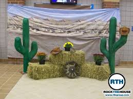 Take some inspiration from this classy looking living room while decorating your home in western style. Western Theme Decorations Cleveland School Dance Djs Host Western Themed Homecoming Western Theme Decorations Dance Themes Barn Dance Decorations