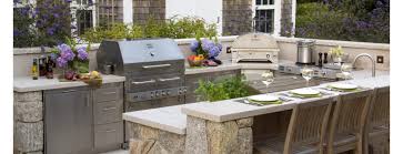 Craig murray cooks steaks in the brick barbecue island in his backyard. How To Build An Outdoor Kitchen 14 Free Plans Plans 1 8