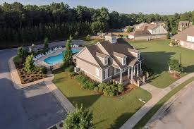 Clubhouse And Pool Amenities At Hillsboro In Helena Al Newcastle Homes Builder Hillsboro New Home Communities Aerial View