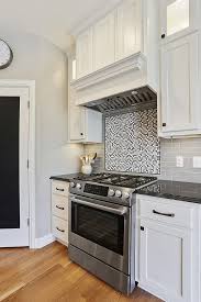 Denash photography, designed by wendy kuhn this bathroom with the toilet room nook and exotic wallpaper has a custom wooden vanity with built in mirrors, lighting, and undermount sink bowls. Pin On Backsplash Ideas
