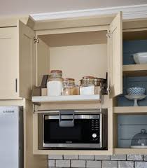 We figured it'd just call for removing a few screws like the last kitchen, but it turns out these cabinets were nailed in. Pull Down Shelf Schuler Cabinetry At Lowes