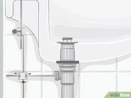 The sink plug (a small bulging metal device used to insert the sink drain) tends to capture hair, soap and you usually see a small stick with nuts and clips attached to the pipe. 3 Ways To Fix A Sink Stopper Wikihow