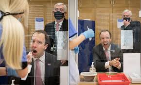 Uk health secretary matt hancock was accused of pretending to cry after footage of him appearing emotional in reaction to news of the world's first coronavirus vaccinations failed to convince many viewers. Matt Hancock Bursts Out Laughing After Swabbing Throat At Parliament S New Self Test Hub Daily Mail Online
