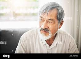 Wise old person hi-res stock photography and images