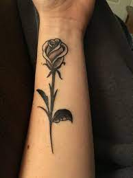 This simple rose tattoo features three single rosebuds that have been shaded and drawn in black. Rose Bud On Forearm Rose Bud Tattoo Black Rose Tattoos Purple Rose Tattoos