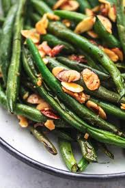 Easy And Tasty Sauteed Green Beans With Garlic And Almonds Recipe You Can Whip Up In 20 Minutes A Delici In 2020 Sauteed Green Beans Garlic Green Beans Sauteed Greens
