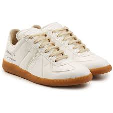 Margiela first entered the sneaker game with its replica style in the early '00s. Pin On Maison