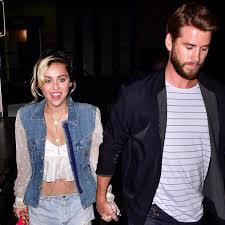 As for the groom, he opted for a black suit and black tie, but swapped the dress shoes for white vans sneakers. Miley Cyrus Just Got Another Huge Ring From Liam Hemsworth