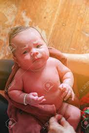 On the other days, wash the hands, feet and diaper area with soap and water. Newborn Child Boy Having His Bath In Mothers Stock Photo Picture And Royalty Free Image Image 92369957