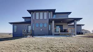 Widhalm Custom Homes Omaha Woodland Model Prairie Modern Mid Century Modern Contemporary Omaha Bennington Nebraska Back Yar Custom Homes House Styles New Homes