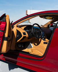 Image result for Magma Red 2011 Aston Martin