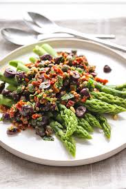 It's a food that pleases even the pickiest of eaters, it's fairly inexpensive and it's easy to cook. Asparagus With Mediterranean Salsa Recipe Elle Republic