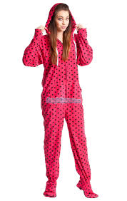 pink polka dots footed pajamas features thumb holes front