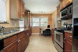 In small kitchens, you'll have limited space to work with. Small Galley Kitchens Pictures Of Kitchens Traditional Medium Wood Cabinets Brown Page Galley Kitchen Layout Kitchen Design Small Online Kitchen Design