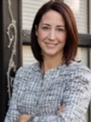 Lawyer advances to November election against judge