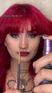 Creating Beauty Marks with the Thinnest Paint Brush