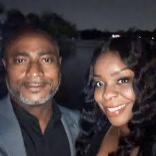 What color should I paint my kitchen cabinets to make the room brighter?