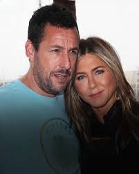 Adam Sandler's wife, Jackie, wowed the Golden Globes crowd in a DARING  BLACK DRESS. 😍 Her "STUNNINGLY BEAUTIFUL" photos are in the comments. 👇