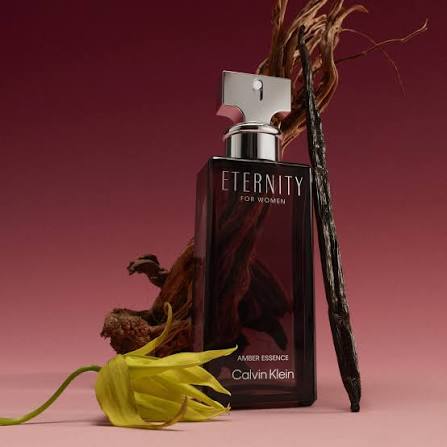 A premium, concentrated new addition, Calvin Klein Eternity Amber Essence  for Her embodies enduring sensuality. With fresh, romantic top notes of  angelica root and intoxicating ylang ylang, the embrace of a warm