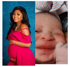 REGINA DANIEL AND HUSBAND BEN NWOKO WELCOME FIRST CHILD