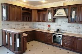4 white kitchen cabinets with dark flooring. Solid Wood Kitchen Style Design Trends 2021 Ekitchentrends