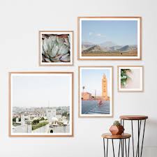 Asymmetrical Gallery Wall With Light Wood Frames Gallery Wall Frames Gallery Wall Gallery Wall Living Room