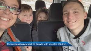 Family recounts journey back to Canada with adopted children from Ukraine