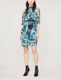 The neckline has a high and hem style neckline. Erdem Melodie High Neck Floral Print Silk Chiffon Blue Green Dress We Select Dresses
