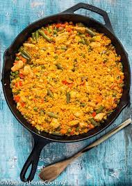 Cook and stir onion, green bell pepper, minced garlic, and whole garlic cloves in the same dutch oven until onion is softened, about 5 minutes. Chicken With Rice Spanish Style Mommy S Home Cooking