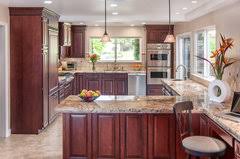 tone down the cherry cabinets