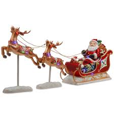 In traditional festive legend, santa claus's reindeer pull a sleigh through the night sky to help santa claus deliver gifts to children on christmas eve. National Tree Company Holiday Christmas Decorative Santa S Sleigh And Reindeer Assortment Overstock 12494161