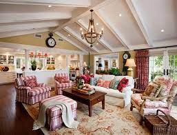 The couch closely resembles a daybed, covered in plus white and gray blankets and pillows. 20 Dashing French Country Living Rooms House Decorators Collection French Country Family Room French Country Decorating Living Room Cottage Style Living Room