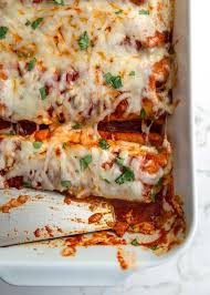 This recipe includes a quick homemade red enchilada sauce and an easy ground beef filling that's ready for the oven in 30 minutes. Ground Beef Enchiladas Kevin Is Cooking