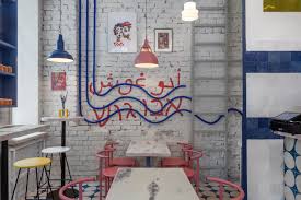 Bathroom wallpaper accent wall in restaurant ideas and concepts. A Colorful Street Food Restaurant Concept In Moscow
