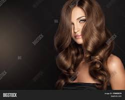 The very best half is that haircuts for curly hair for volume hair works nicely with straight, curly, or wavy hair types and will be worn in many ways, including street or basic types. Brunette Girl Long Image Photo Free Trial Bigstock
