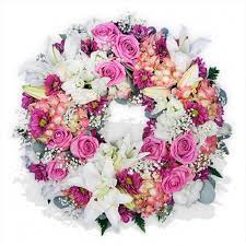 Maybe you would like to learn more about one of these? Pinks And Lilies Funeral Wreath Send Funeral Flowers