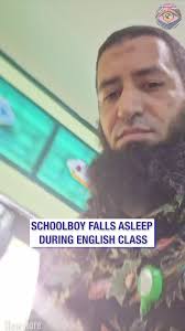 Schoolboy falls asleep during English class