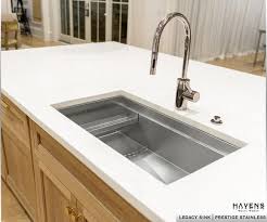 • a stainless steel kitchen sink installation. Custom Stainless Steel Sinks Usa Handcrafted Havens Luxury Metals