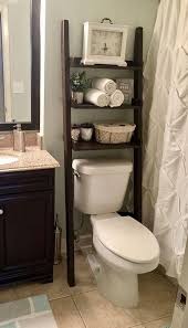 Are you sick of those ugly, flimsy shelves balancing over your toilet in your bathroom? Diy Over The Toilet Ladder Shelf Novocom Top