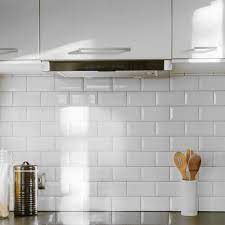 We love the brick wall and marble countertop! Bevelled Brick White Gloss Wall Tiles Retro Metro Tiles 200x100x5mm Tiles White Kitchen Wall Tiles White Kitchen Splashback Kitchen Splashback Tiles