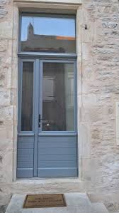 Porte D Entree Tiercee Avec Imposte Soubassement A Lames Horizontales Bequillage Brionne Modele Fra Entree Maison Porte Entree Maison Deco Style Industriel