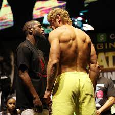 Floyd mayweather, left, and logan paul face off during a press event thursday, june 3, 2021, in miami beach, fla. K4aeraeaenahsm