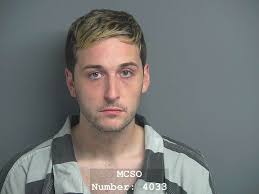 Conroe man jailed after allegedly hitting police vehicle and fleeing