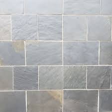 This astonishing slate tile is a combination of grey and silver with a magnificent natural finish. Slate Strip Walling Slate Cladding Slate Rivens Slate Tiles Clarens Natural Stone