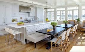 A stainless steel range and oven is flanked by classic white cabinets with nickel hardware. 25 Absolutely Gorgeous Transitional Style Kitchen Ideas
