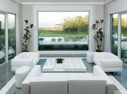 All White Beautiful Living Room With Soft Paded Sofa Set And Big Window Surrounding Beautiful Living Rooms Beautiful Room Designs Living Room Sets Furniture
