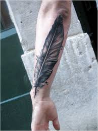 Tattoos of eagle feathers symbolize courage and strength, as well as the strength of ideas and the conviction to keep them. 30 Creative Forearm Tattoo Ideas For Men And Women Creativetattoos Click To See More Feather Tattoo Design Feather Tattoo Arm Tattoos For Guys
