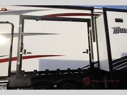 Fifth wheel equipment trailer for sale at the trailer showroom. Grand Design Momentum Toy Hauler Discounted Over 30