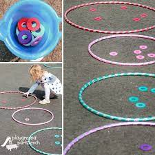 With all the games and toys kids have to choose from, something as simple as a hula hoop might seem a little old school. 5 Action Packed Hula Hoop Games For Kids Hula Hoop Games Hoop Games Outdoor Games For Kids